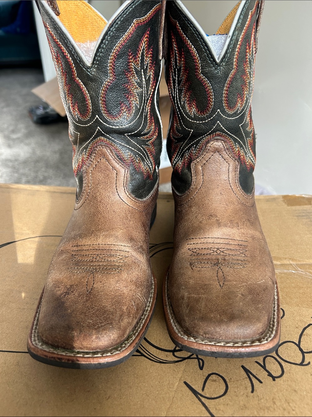 Ariat Brown Distressed Leather Cowboy Boots with Black Shaft and Red Stitching